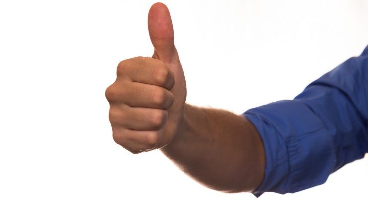 image of a man giving a thumbs up